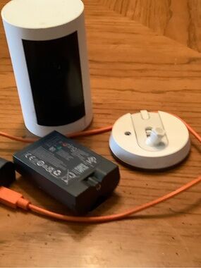 Ring Indoor/Outdoor security camera with New Extra Battery and charging cable.